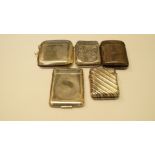 Four silver vesta cases; and a similar notebook case, 127g.