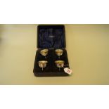 A cased set of four silver salts, by J S & S, Birmingham 1915, 149g.