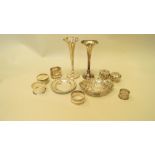 Two silver trumpet vases; together with five various silver napkin rings; two small silver dishes;