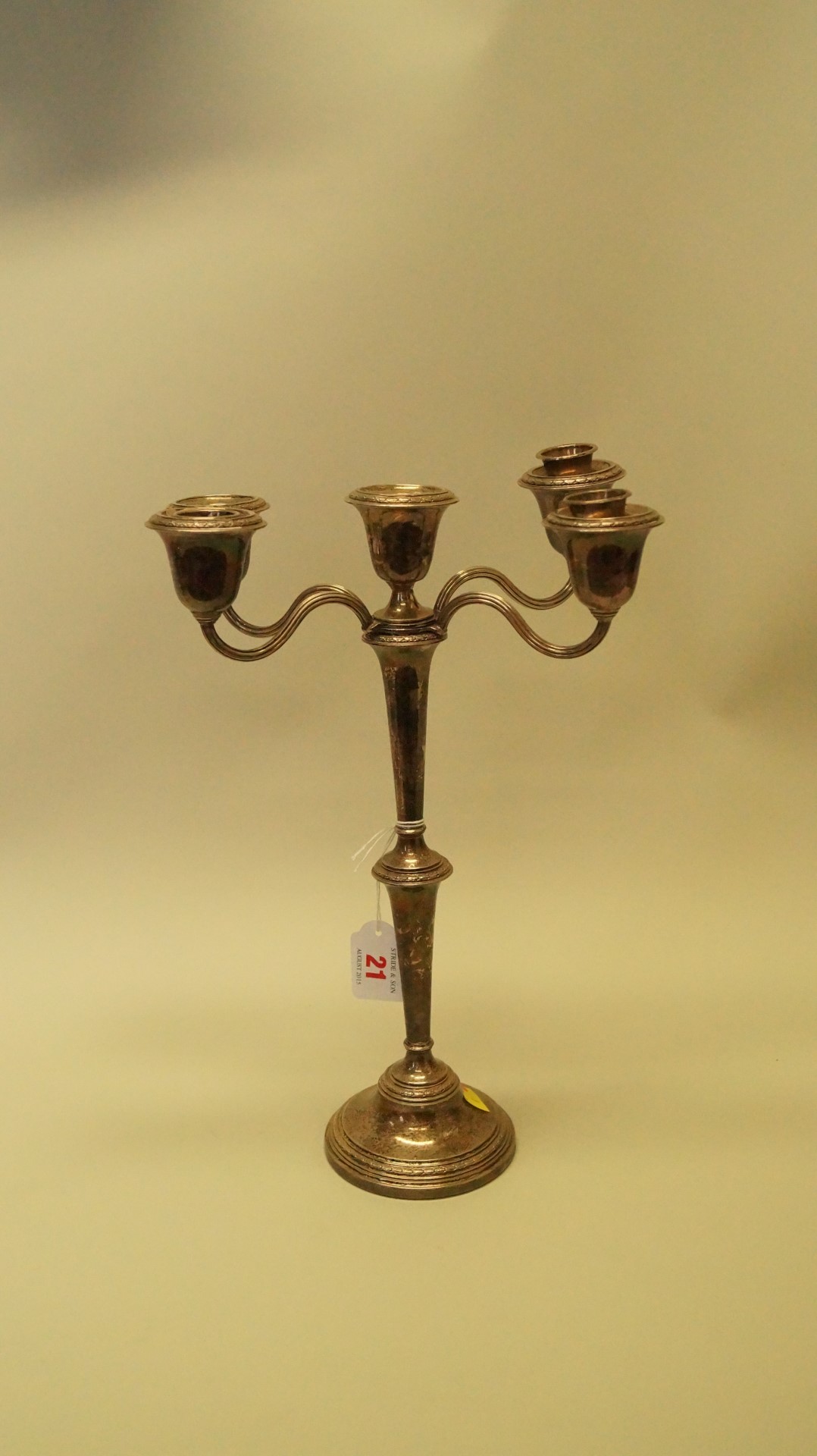 A silver adjustable four branch candlabrum, by Adie Brothers Ltd, Birmingham 1957, 32cm, weighted.