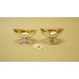 A pair of George III silver oval footed salts, possibly by Thomas Hemming, London 1784, gilt lined,