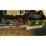 A Scalextric Formula 1 set; together with another Scalextric Grand Prix set;