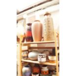 A quantity of West German pottery vases and bowls, (four shelves). Condition Report: LOT ALTERED-