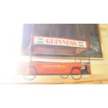 A vintage Guinness 'Take Some Home Today' omnibus display stand, 46.5cm long.