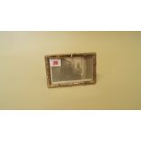 A Chinese silver easel photograph frame, by Wang Hing, 14.7 x 9.7cm. Condition Report: Although