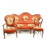 SILLERÍA ISABELINA Formada por sofa, dos sillones y seis sillas en madera de caoba, tapizadas en