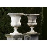 Garden Seat: A pair of carved white marble urns  2nd half 19th century 73cm.; 29ins high by 62cm.;