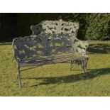Garden Seat: A pair of Coalbrookdale Fern and Blackberry cast iron pattern seats  late 19th