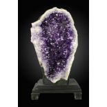 Minerals: An impressive Amethyst geode  Brazil 122cm.; 48ins high on wooden stand