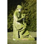 Garden Sculpture: A carved Portland stone figure of Plenty holding a cornucopia  circa 1900