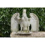 Garden Sculpture: A pair of carved gritstone eagles  late 19th/early 20th century 94cm.; 37ins