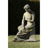 Garden Sculpture: A carved Portland stone figure of a seated maiden  circa 1900 145cm.; 57ins high