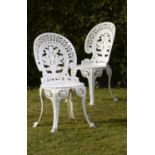 Garden Seat: A pair of rare Falkirk Foundry cast iron chairs  circa 1860 each fully stamped