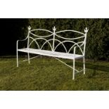 Garden Seat: A Regency reeded wrought iron seat  early 19th century 186cm.; 73ins wide