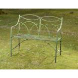 Garden Seat: A Regency reeded wrought iron seat  early 19th century 110cm.; 43ins long