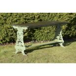 A rare Victorian cast iron conservatory table  circa 1870 the end stamped Welcome  with associated