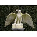 Garden Sculpture: A pair of carved Cotswold stone eagles  19th century  70cm.; 28ins high by 132cm.;