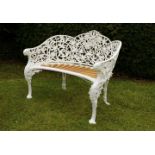 Garden Seat: A Coalbrookdale Passion Flower pattern cast iron seat  circa 1870 with diamond