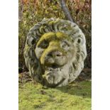 A composition stone lion mask    late 20th century  76cm.; 30ins high