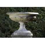 Garden Urn: A carved white marble urn    late 19th century  53cm.; 21ins high by 75cm.; 29½ins wide