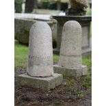 Two Bourgogne stone bollards    19th century  68cm.; 27ins high