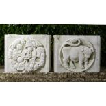 A set of four carved Portland stone plaques    1950's  the largest 53cm.; 21ins square