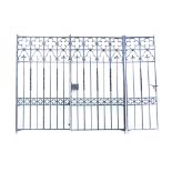 A pair of Victorian wrought iron gates    late 19th century   incorporating a side gate  230cm.;