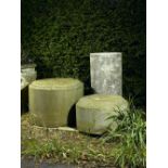 Three carved stone pedestals    19th century   including one oval 55cm.; 22ins high by 91cm.;