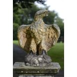 Garden Sculpture: A pair of painted composition stone figure gatepier eagles    possibly Austin