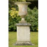 Garden Urn: A carved white marble Campana shaped urn    late 19th century   on associated carved