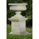 Garden Urn: A carved limestone tazza urn on pedestal    modern  107cm.; 42ins high