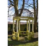 A carved limestone and wrought iron rotunda    modern  400cm.; 157ins high by 270cm.; 106ins