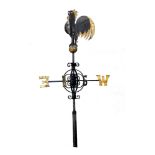 A Victorian cockerel wrought iron weathervane    late 19th century  226cm.; 86ins, the cockerel