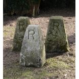 A set of three staddlestone bases    each inscribed with the letter R  63cm.; 25ins high