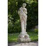 Garden Sculpture:A rare Bromsgrove Guild composition stone statue of Pan  early 20th century 232cm.;