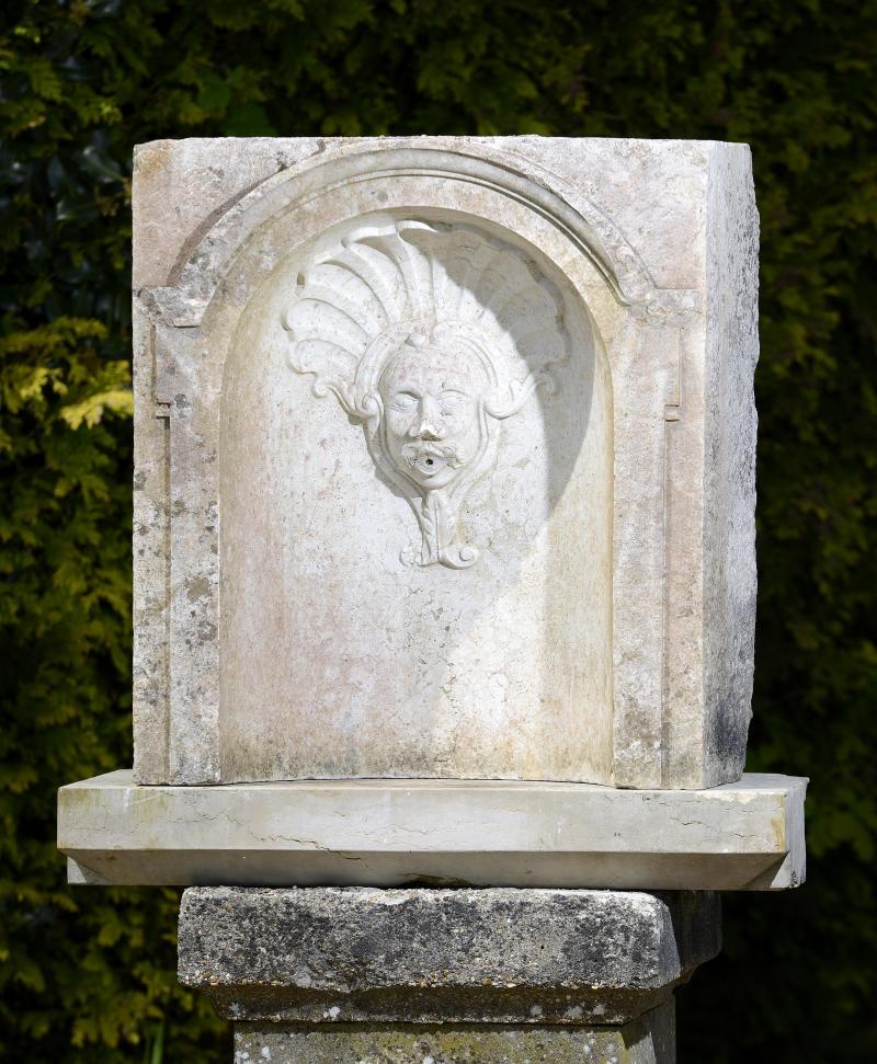 A Louis XVI carved marble wall fountain  mid 18th century mouth drilled for water 73cm.; 29ins