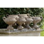 Garden Urn: A near set of six Pulham stoneware urns  circa 1870 some stamped the largest 51cm.;