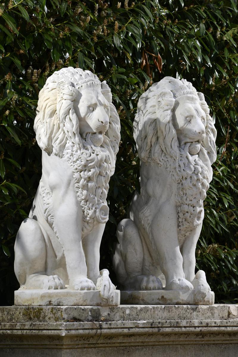 Garden Sculpture:A pair of carved white marble lions  Italian, late 19th century 104cm.; 41ins high