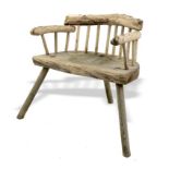 A very rare bleached oak garden chair  18th/19th century stick backed with arms on three legs