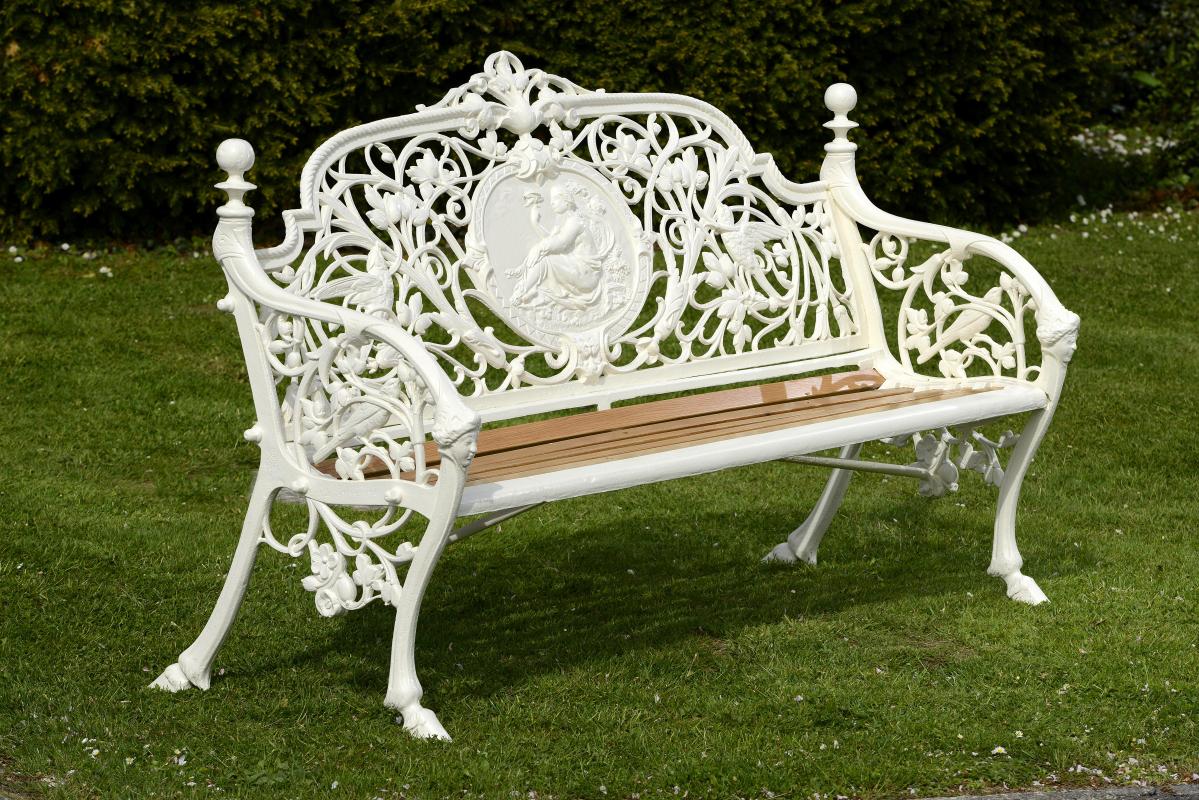 Garden Seat:A Coalbrookdale Medallion pattern cast iron seat  last quarter 19th century fully