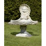 A rare carved white marble fountain  French, 18th/19th century 107cm.; 42ins high by 102cm 40in wide