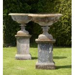 Garden Urn: A pair of rare cast iron urns on pedestals  2nd half 19th century 150cm.; 59ins high