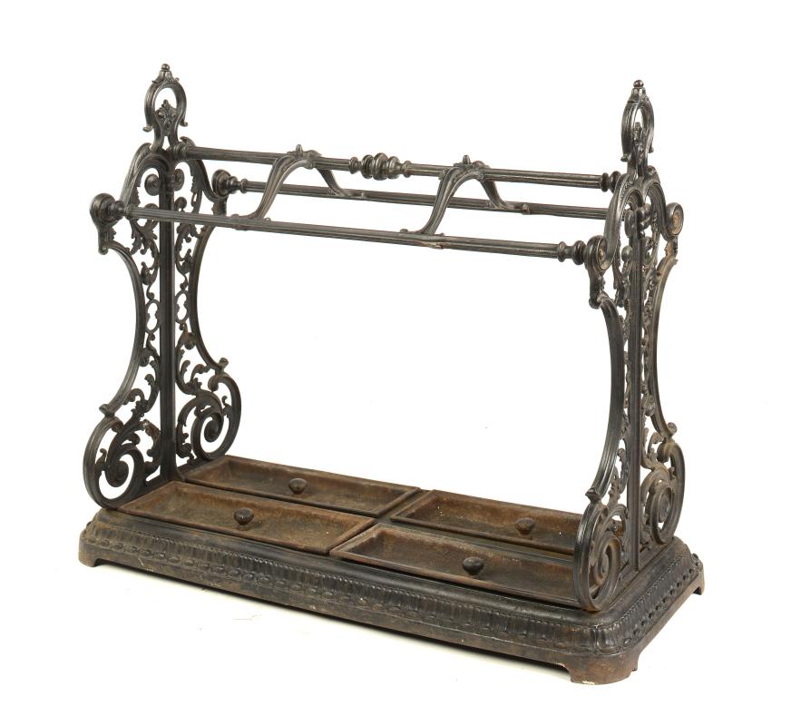 A Carron Foundry cast iron stick stand  circa 1870 the four lift out trays with Victorian diamond