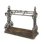 A Carron Foundry cast iron stick stand  circa 1870 the four lift out trays with Victorian diamond