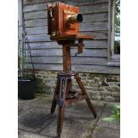A Camera on Adjustable Stand  From the Studio of Robert Lenkiewicz 195cm.; 73¾ins high by 78cm.;