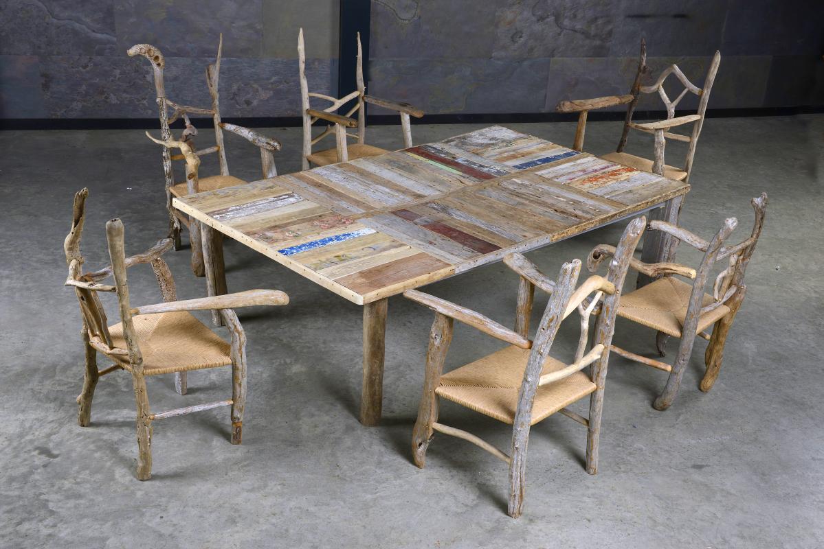 The accompanying suite of furniture comprising a table and six chairs by Silas Birtwistle the