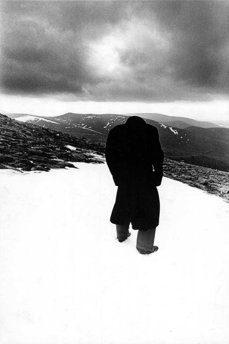 *†Eddie Powell (b.1950)  Figure in the Landscape 'Headless in the Cairngorns'Black Frame Signed A.P.