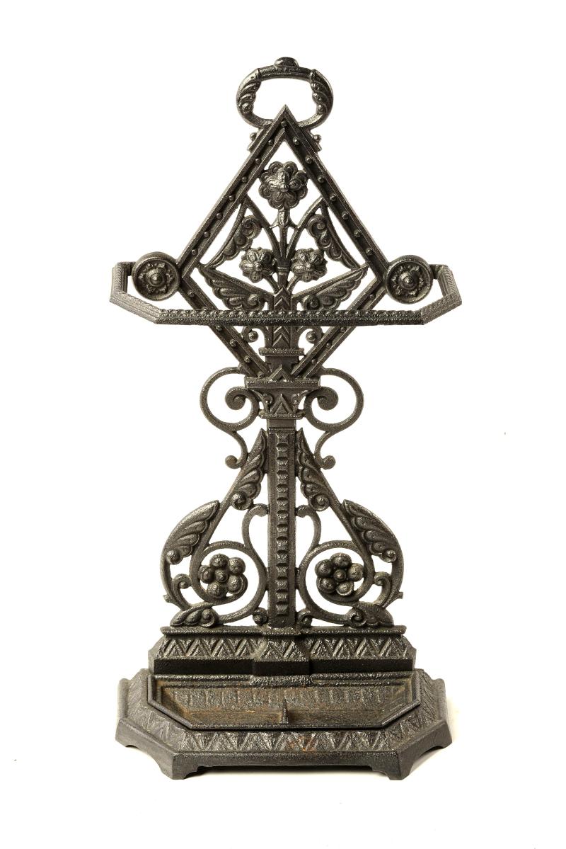 A Carron Foundry cast iron stick stand  Scottish, circa 1880 with lift out tray bearing diamond