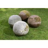 A pair of composition stone gatepier balls  1st half 20th century 43cm.; 17ins diameter