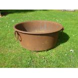 A cast iron circular trough  late 19th century stamped Ransomes & Sims, Ipswich 99cm.; 39ins